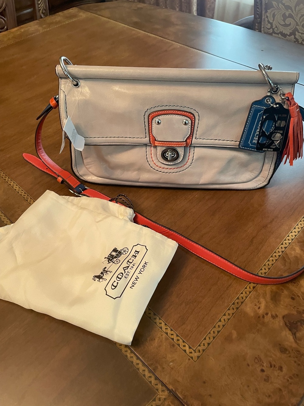 Coach City Willis silver gray / tangelo color block Crossbody Bag.